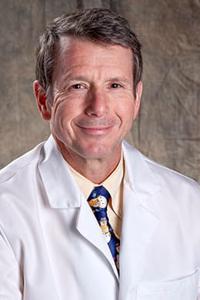 Christopher W Hughes