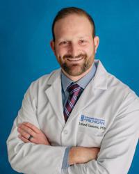 Leland E Gossett, MD